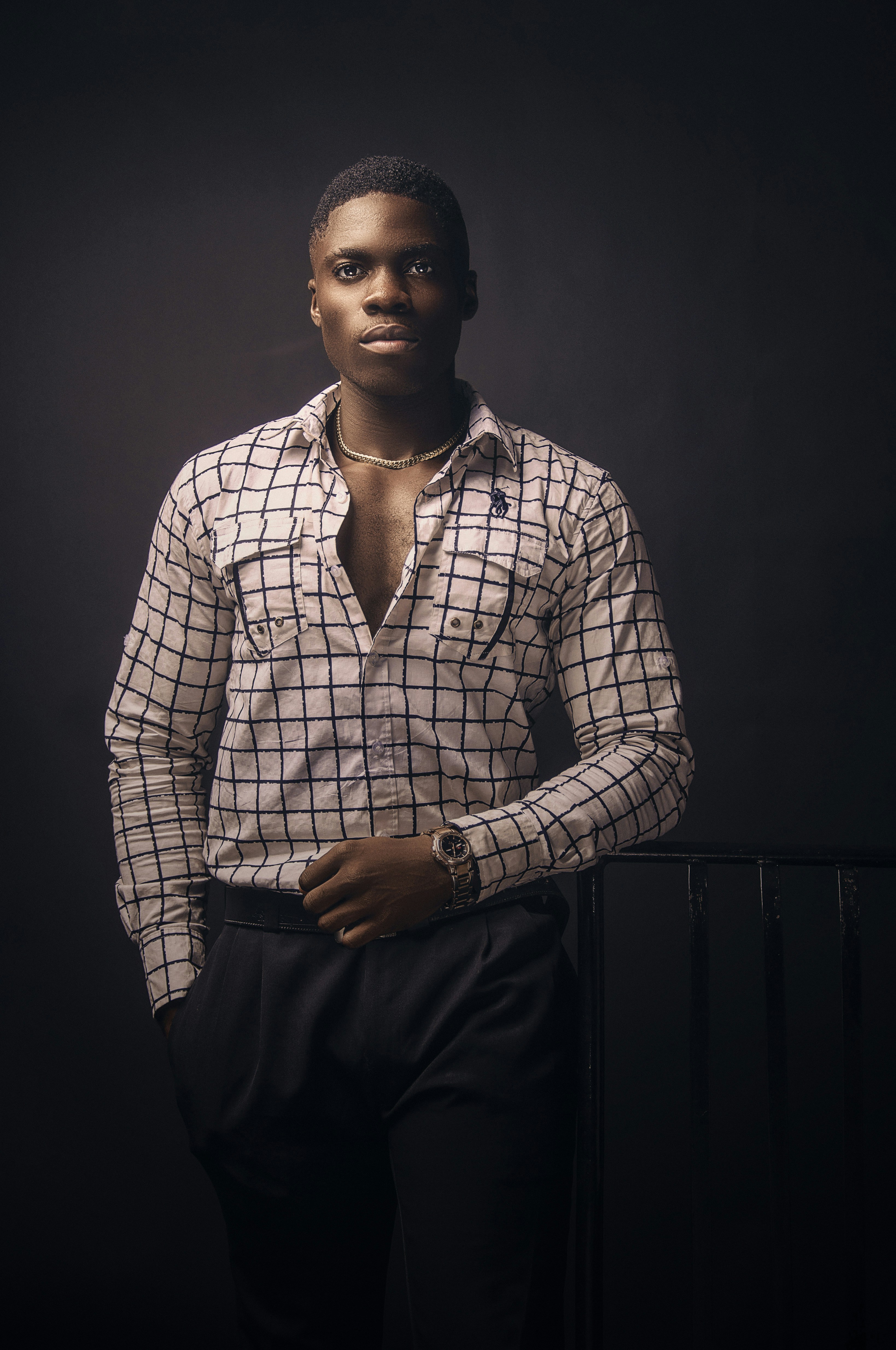 man in white and black plaid dress shirt